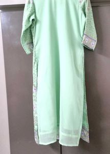 Elegant Mint Green Embroidered Kurti