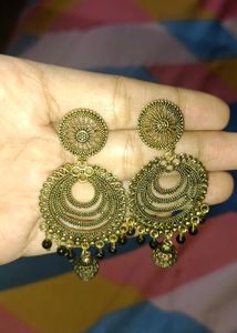 A Pair Of Traditional Style Earrings