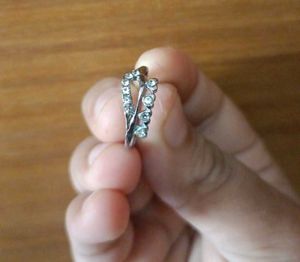 Assorted Jewelry Lot: Ring, Earrings, &amp; Hair Tie