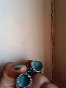 Jhumkaa earrings with green beads