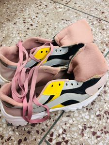 Well-loved Pink Sneakers