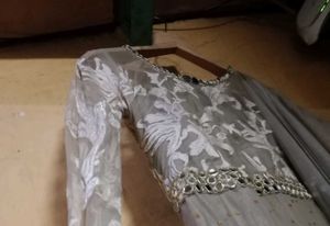 Elegant Grey Embroidered Gown for Festive Occasion