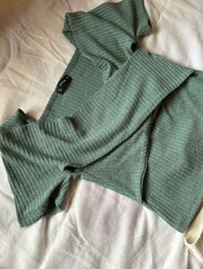 Sage green ribbed knit wrap-style top