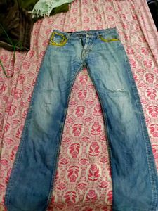 Distressed Denim Jeans