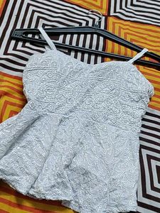 White Embroidered Peplum Top With Padded And Adjus
