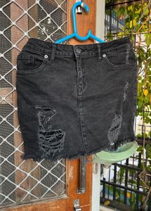 Ripped denim skirt