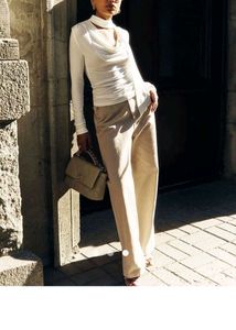 Elegant White Drape Top