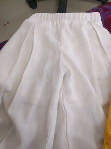 Yellow Embroidered skirt and white plazzo