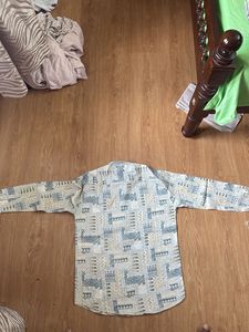 Off white Shirt With Blue Design
