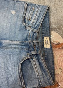 Distressed Wide-Leg Jeans