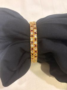 Elegant Gold-Plated Bangles with Gemstones