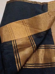Black saree with golden sare