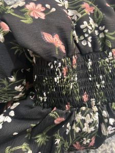 Black floral peplum top