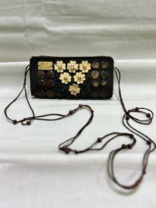 Brown Hand Clutch With Wooden Beads
