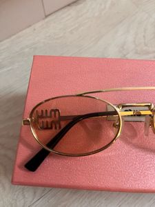 Prada (MiuMiu) Sunglasses
