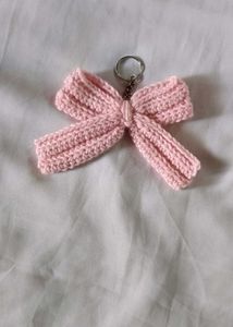 A Crocheted Pink Bow Keychain