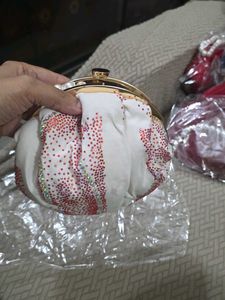 White Designer Potli Clutch With Pearl Handle