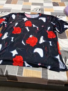 smart black top with red flowers on it