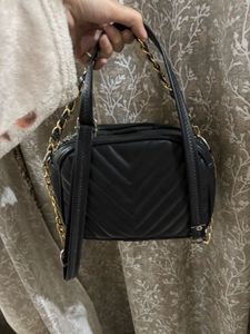 A black crossbody bag