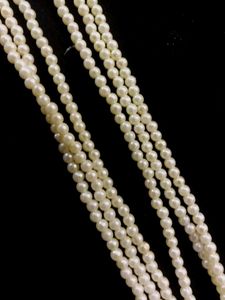 Pearl Chain With Peacock Locket