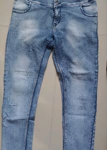 Scratched Denim Blue Jeans