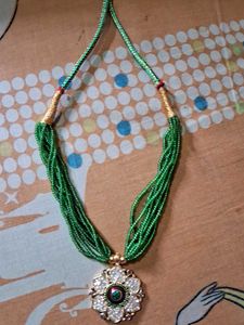Multi Layered Cute Green Beats Mala With Locket