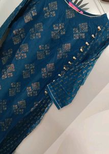 Tail Blue Colour Kurti With Beautiful Golden Pattern