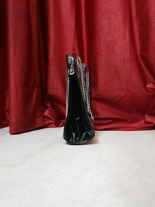 Black Handbag With Gold Detailing