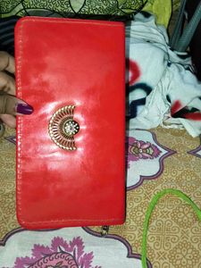 Red Clutch with Gold Embellishment