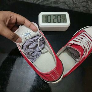 Red Low-Top Canvas Sneakers.