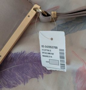 70% Off on Mauve Clutch/Wristlet