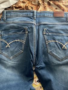 Distressed Blue Jeans