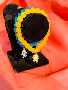 For Brother/Sister, Cute Doraemon Theme Bracelets In Blue And Yellow.