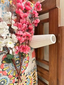 White Ceramic Vase with Flowers