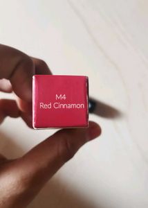 Rosy gold red lipstick