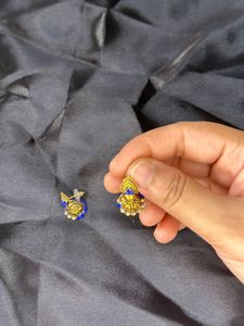 Blue Jhumka Earrings and silver stoned stud