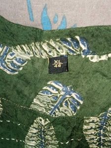 Green leaf-patterned dress