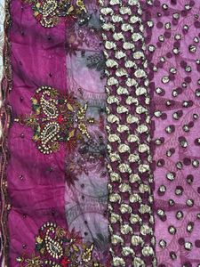 Heavy Purple Stone And Sequin Work Net Saree