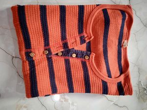 orange pretty top.