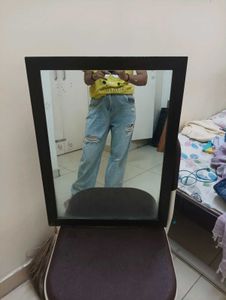 damaged jeans .