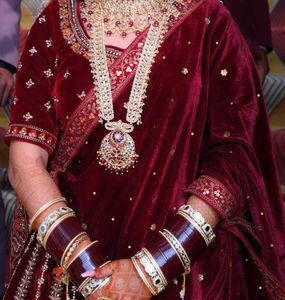 Maroon Velvet Bridal Saree with Jewelry