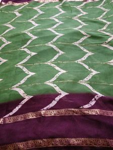 Green,Georgette With Maroon Border.