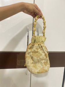 Elegant Gold Embroidered Potli Bag