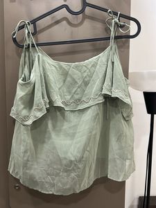 A teal sequinned top perfect for parties