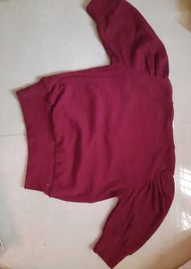 Maroon front cinch crop top with puff sleeves