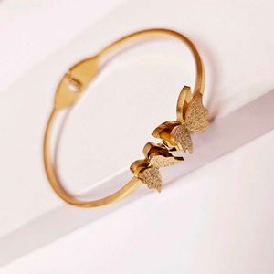 Golden Twin Butterfly Cuff Bracelet