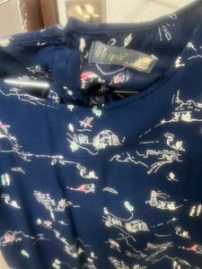 Blue Top With White Graphics