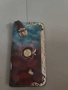 Stylish clutch for women with clasp lock