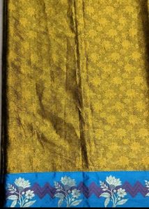 Unused Golden Colour Saree With Blue Border