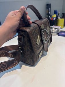 Brown Patterned Satchel with Embellishments